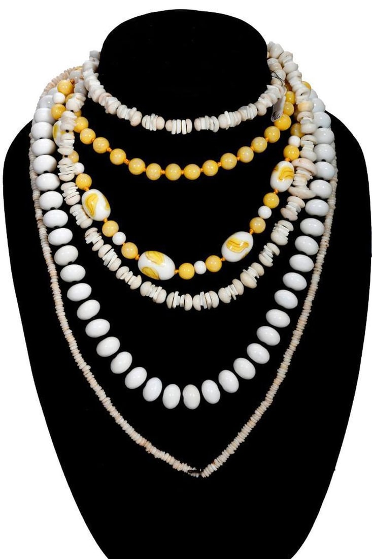 A group of costume and beaded jewelry: the 40+ pieces including turquoise, tiger's eye, wood, glass, crystal, onyx, rose quartz, carnelian, coral, cub zirconia