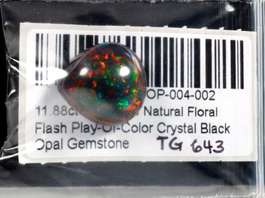 An unmounted black opal