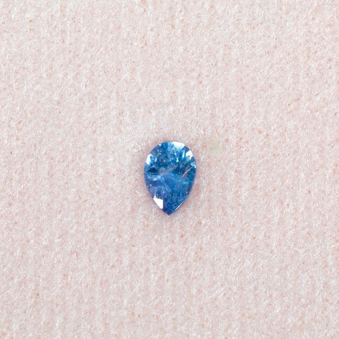 An unmounted benitoite: the pear-shaped benitoite measuring approximately 4.80 x 3.40 x 2.30mm and weighing 0.25 carat