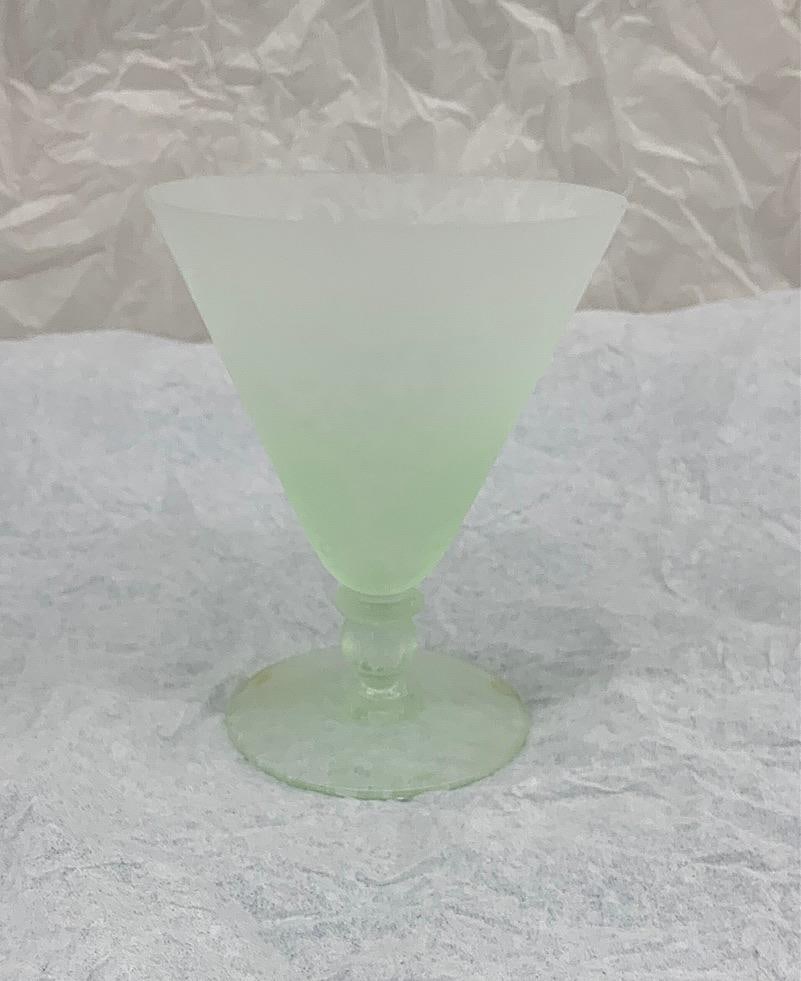 CCAA GLASGALERIE KOLN Glass Cup: Reproduction from antique glass, goblet in funnel form, frosted light green glass; etched 4051 670 CCAA 1986 on bottom. 4 3/4 x 3 3/4 inches dia. (12.1 x 9.5 cm dia.) Provenance: CCAA Glass Gallery Co