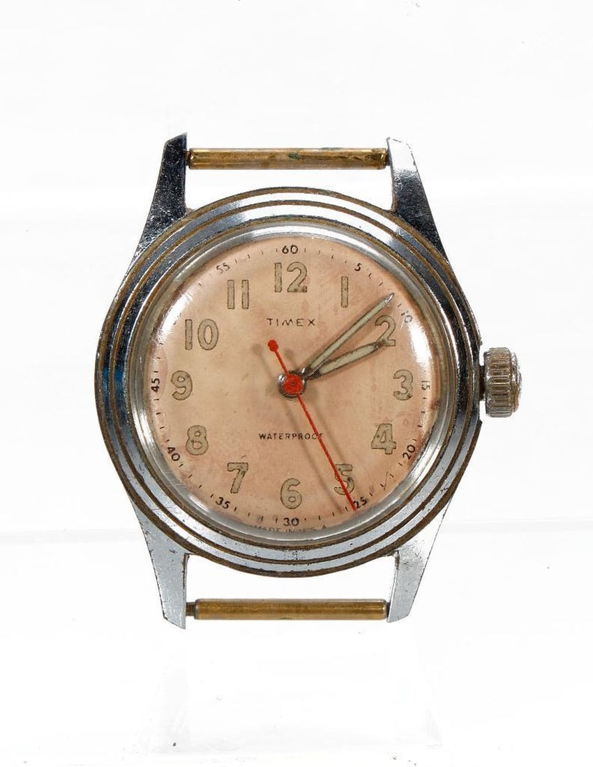 Vintage Classic Mechanical Timex Watch: A 1950s U.S. Time Corporation Timex watch, waterproof (no band). NOTE: Watches were running prior to auction, all watches are sold as is regardless of functionality. Please examine the provided photos