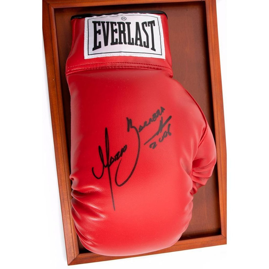 Marco Antonio Barrera signed boxing glove: Marco Antonio Barrera signed boxing glove with display case. H:8.7 inches. W: 15 inches. Depth: 9.7 inches.