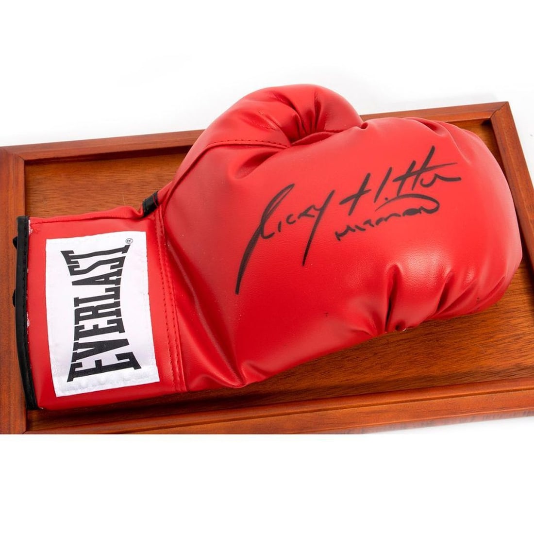 Autographed Boxing Glove By Ricky Hatton: Autographed Boxing Glove By Ricky Hatton with display case. H:8.7 inches. W:15 inches. Depth:9.7 inches.
