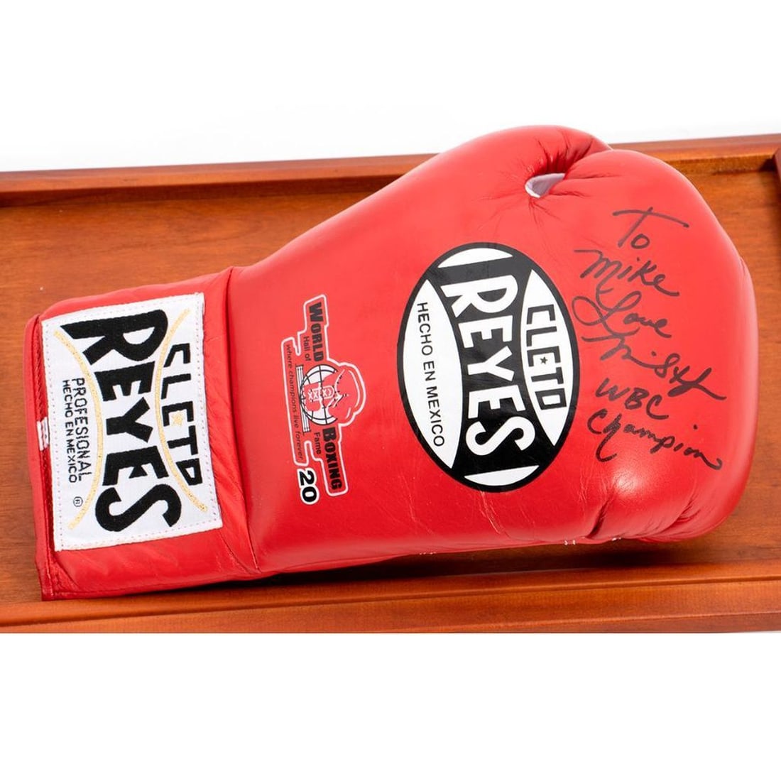 WBC Champion Autographed boxing glove: WBC Champion Autographed boxing glove with display case. H: 8.7 inches. W: 15 inches. Depth: 10 inches.