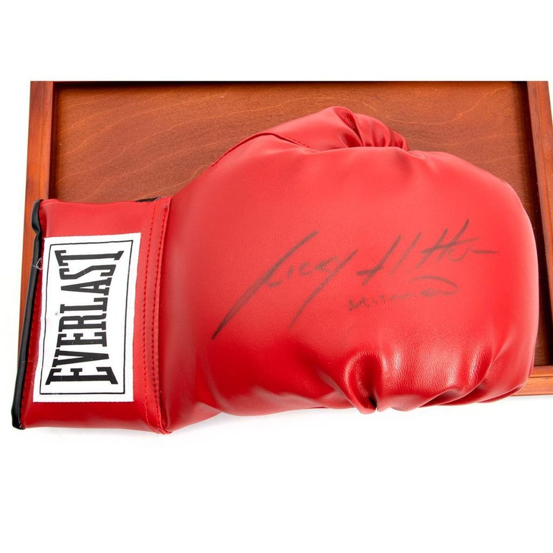 Autographed Boxing Glove By Ricky Hatton: Autographed Boxing Glove By Ricky Hatton with display case. H: 8.7 inches. W: 15 inches. D: 9.7 inches.