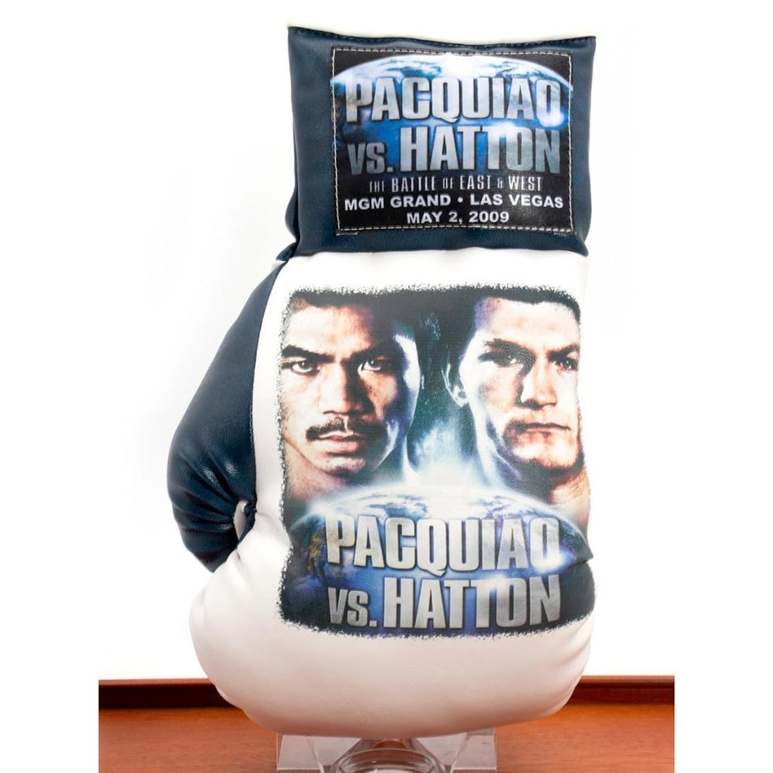 Pacquiao VS. Hatton souvenir boxing glove: Pacquiao VS. Hatton souvenir boxing glove with display case. H:8.7 inches. W: 15 inches. Depth: 9.7 inches.