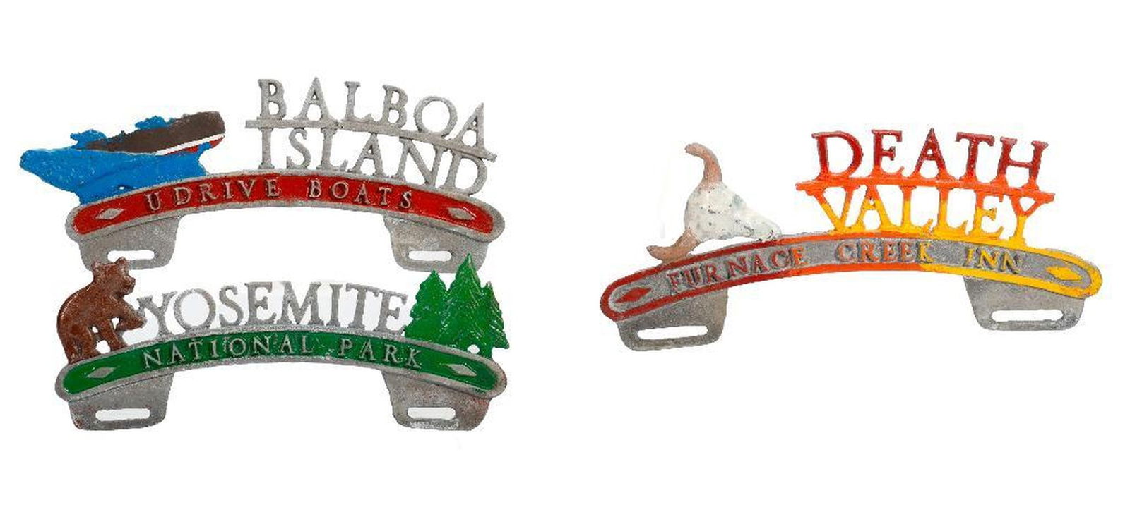 Three License Plate Toppers, California: A group of vintage cast aluminum license plate toppers: 1.) Yosemite National Park. 2.) Death Valley, Furnace Creek Inn. 3.) Balboa Island, U Drive Boats. Greatest length 12".