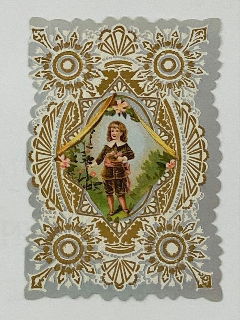 Vintage valentine card: boy holding flowers: Vintage Valentine card: boy holding flowers. Valentine with boy wearing a brown suit and holding flowers on center, gray with gold and white ornate pattern background; printed greetings inside. Medium