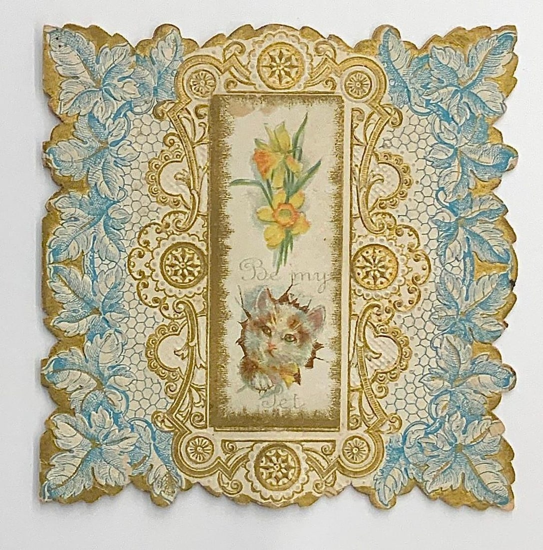 Valentine Card: daffodils and cat, "Be My Pet": Valentine with lift-up section, illustration of daffodils and cat, "Be my / Pet", gold frame, blue and gold foliage background; printed greetings inside. Medium: paper, ink. Source: The Old Print Shop