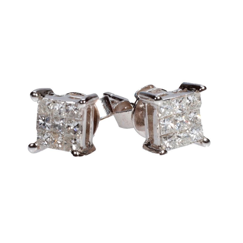 A pair of diamond and 14k white gold earrings (1 of 2)