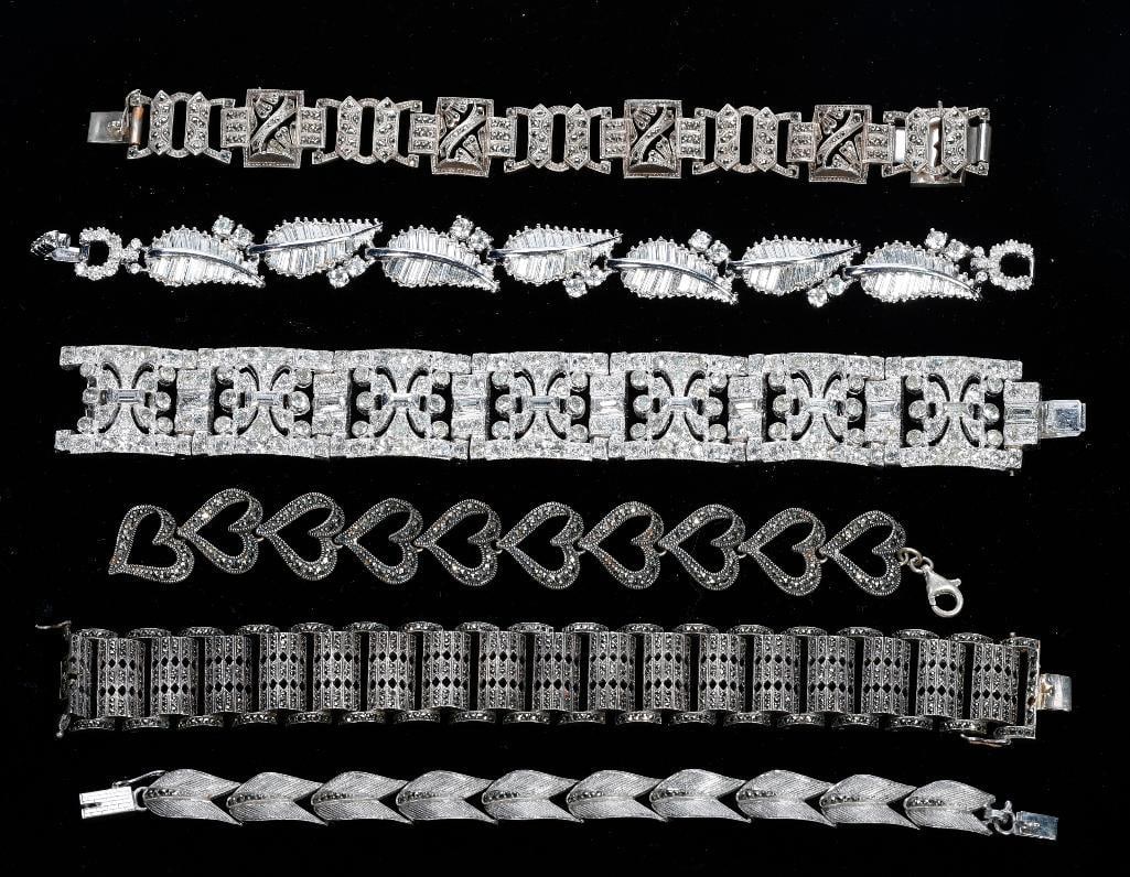 A collection of antique & vintage rhinestone jewelry: 16 pieces, with paste, rhinestone, and silver, including S. Christian Germany and Pennino