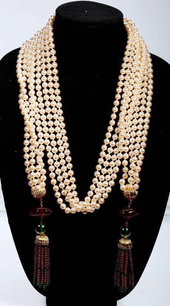 Three costume necklaces: with glass beads and faux pearls; unsigned, attributed to Daniele Cornaggia, with signed pouch; lengths 32, 44 and 62 in.