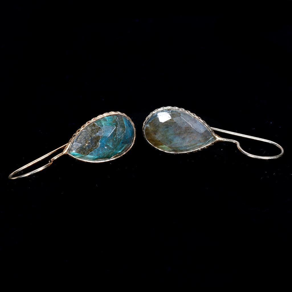 A pair of labradorite pendant earrings: featuring two pear-shaped rose-cut labradorites, bezels-set in gold plated sterling silver; length: 1 1/4 in.