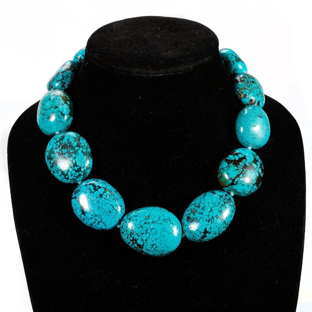 A turquoise and silver necklace (1 of 3)