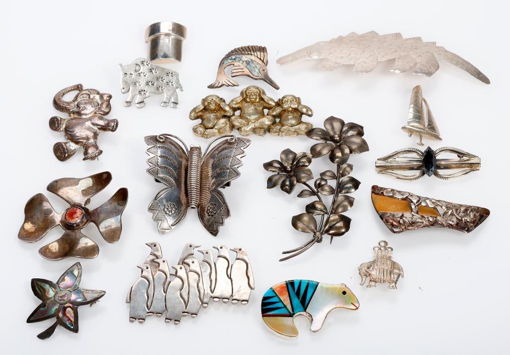 Sixteen silver brooches (1 of 5)