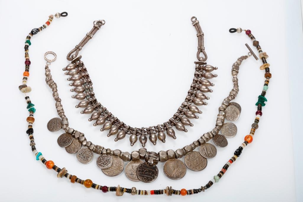 Twelve bead, silver and metal necklaces (1 of 5)