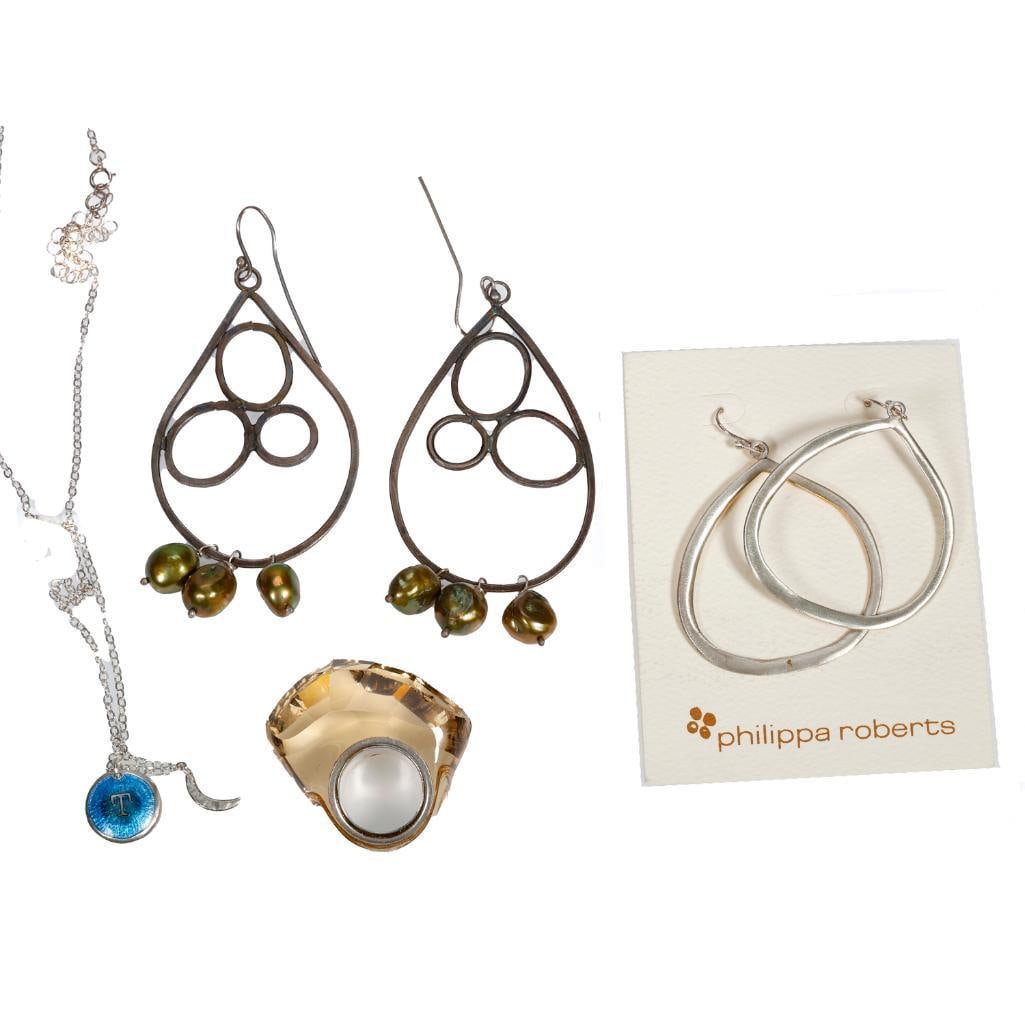 A group of gem-set and silver jewelry: comprising a pair of Philippa Roberts earrings, a button-shaped freshwater cultured pearl necklace, length 52in.; an enameled pendant-necklace, a faceted quartz hololith ring, and a pair of blackened