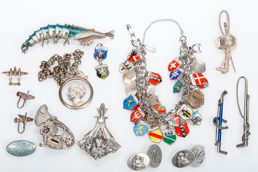 A group of vintage silver and metal jewelry (1 of 3)
