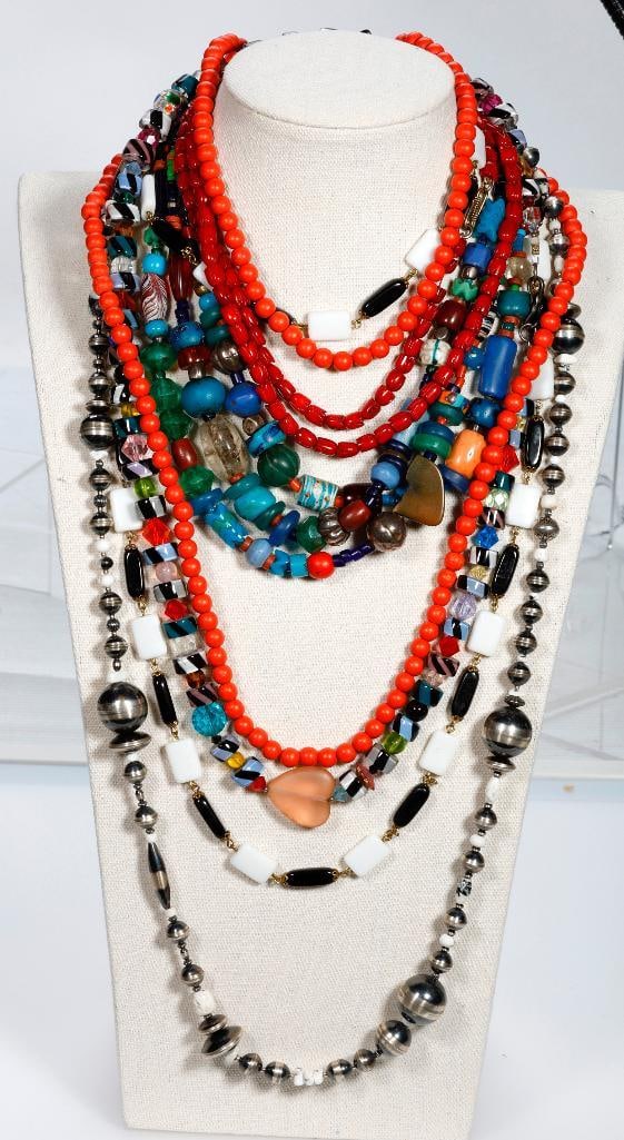 A group of beaded necklaces and bracelets (1 of 3)