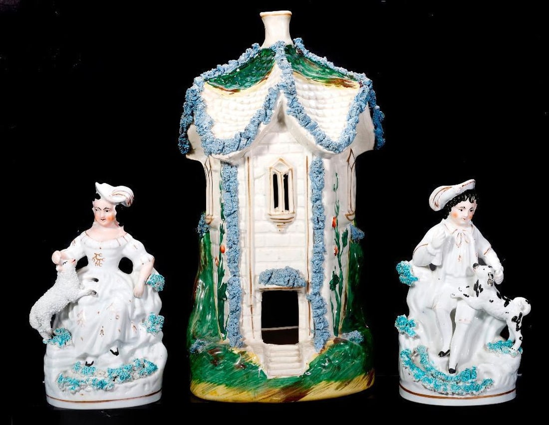 Five Staffordshire Figures Including a Cottage Pastille Burner and A Hunting Dog: Comprising a large Staffordshire porcelain two-story cottage pastille burner (11.5: x 5.5" x 3"); a pair shepherd figures (each. 6 1/2"); a Staffordshire pottery spill vase of a dog
