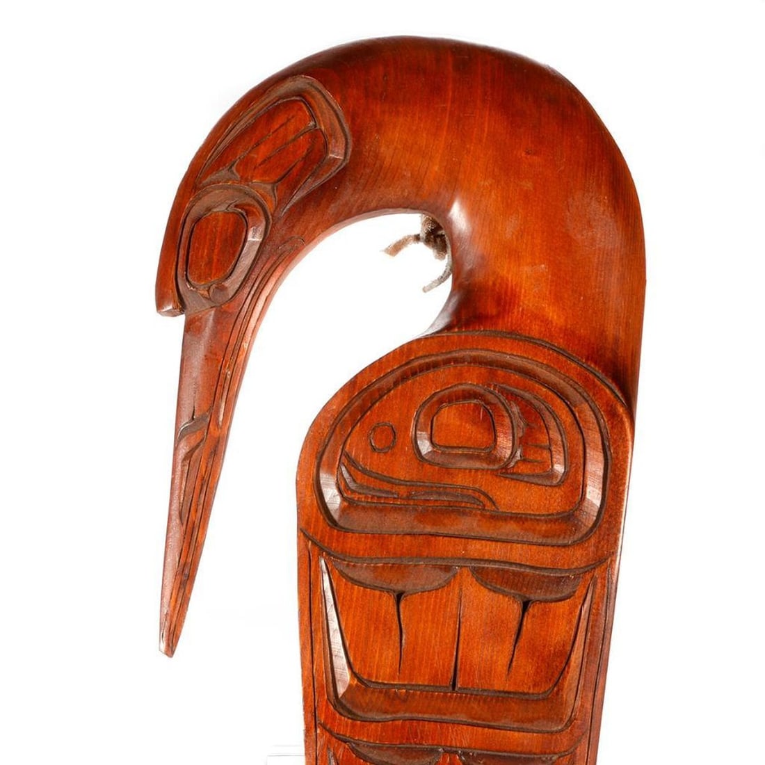 Salish Wood Carving of A Loon: Carved as a plaque headed by head of loon, over a stylized wing carved in deep relief. Inscription in written pen on verso "Loon/Ron Aleak/Coast Salish/Namaino/1984",