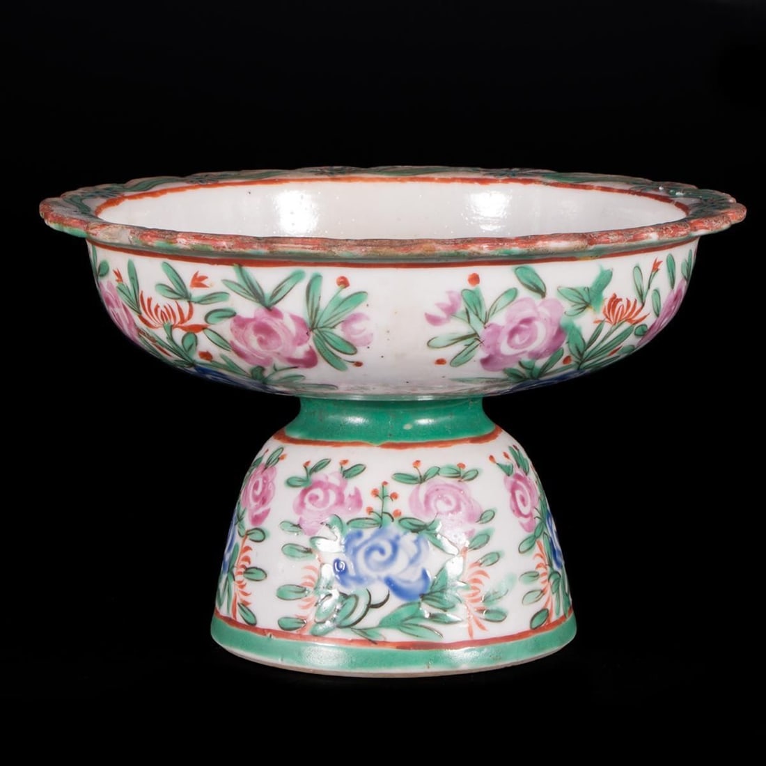 Chinese Pedestal Bowl.: 19th century footed bowl painted with mythical beasts. Small chips to rim. 3 1/2 inches high x 5 1/4 diameter.
