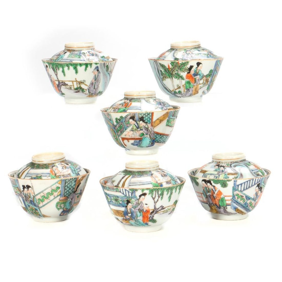 Six Chinese Porcelain Lidded Tea Bowls: Each polychrome decorated with figures in garden settings, painted carp interior of bowl. Character marks on bottom. 4in. h. Condition: Wear to gilding