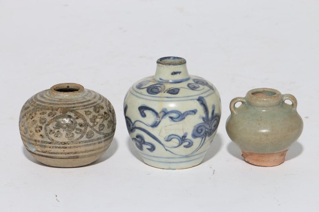 Three Chinese Ming Period Small Pottery Vessels: A group of three Chinese small pottery vessels, Ming period, 15th century or earlier. Largest example 3 1/2 inches high.