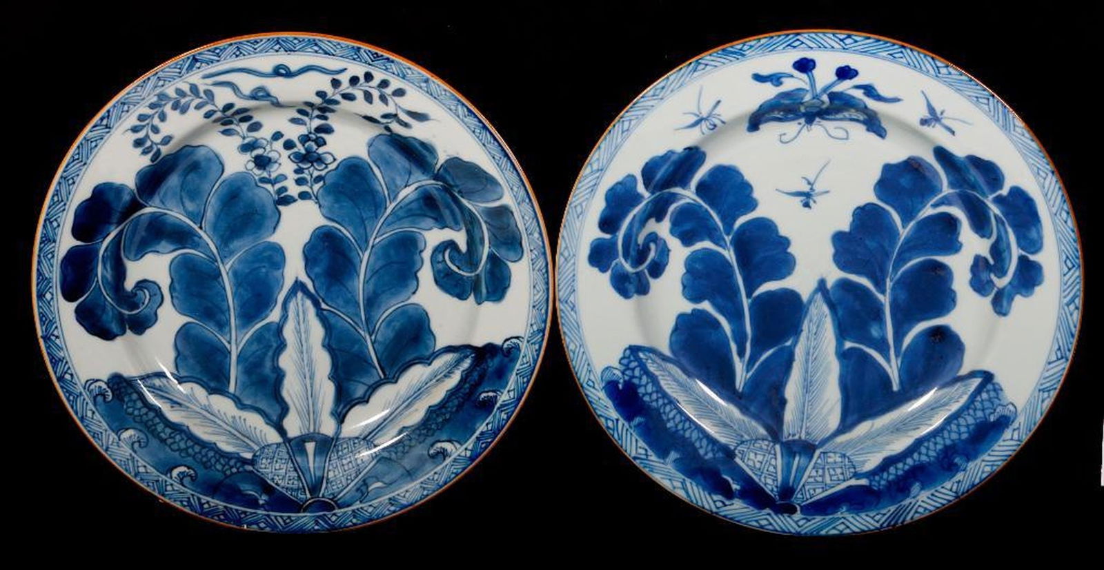Set of Chinese Kangxi Blue and White Plates (4). Property of Alton F. Irby III: Set of four blue and white plates with a similar design of large leaves, all but one with insects above the foliage, the rims with a geometric band, and linear design under the rims. Each