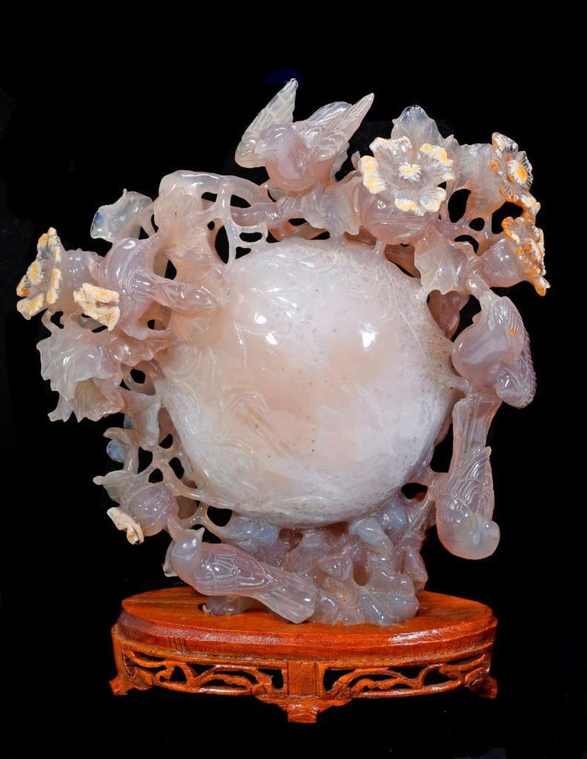 Chinese Carved Agate Pumpkin: The carved agate stone pumpkin surrounded by flowering vines with five perched birds. Carving approx. 6 1/2" x 7". Mounted on wood stand (with stand 8" high). Condition good.