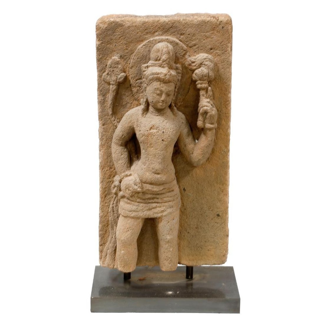 Southeast Asian Stone Carving: The stele form sculpture carved of granite or volcanic stone featuring a seated figure of Shiva or Vishnu, 32.5"h x 16"w x 8"d.