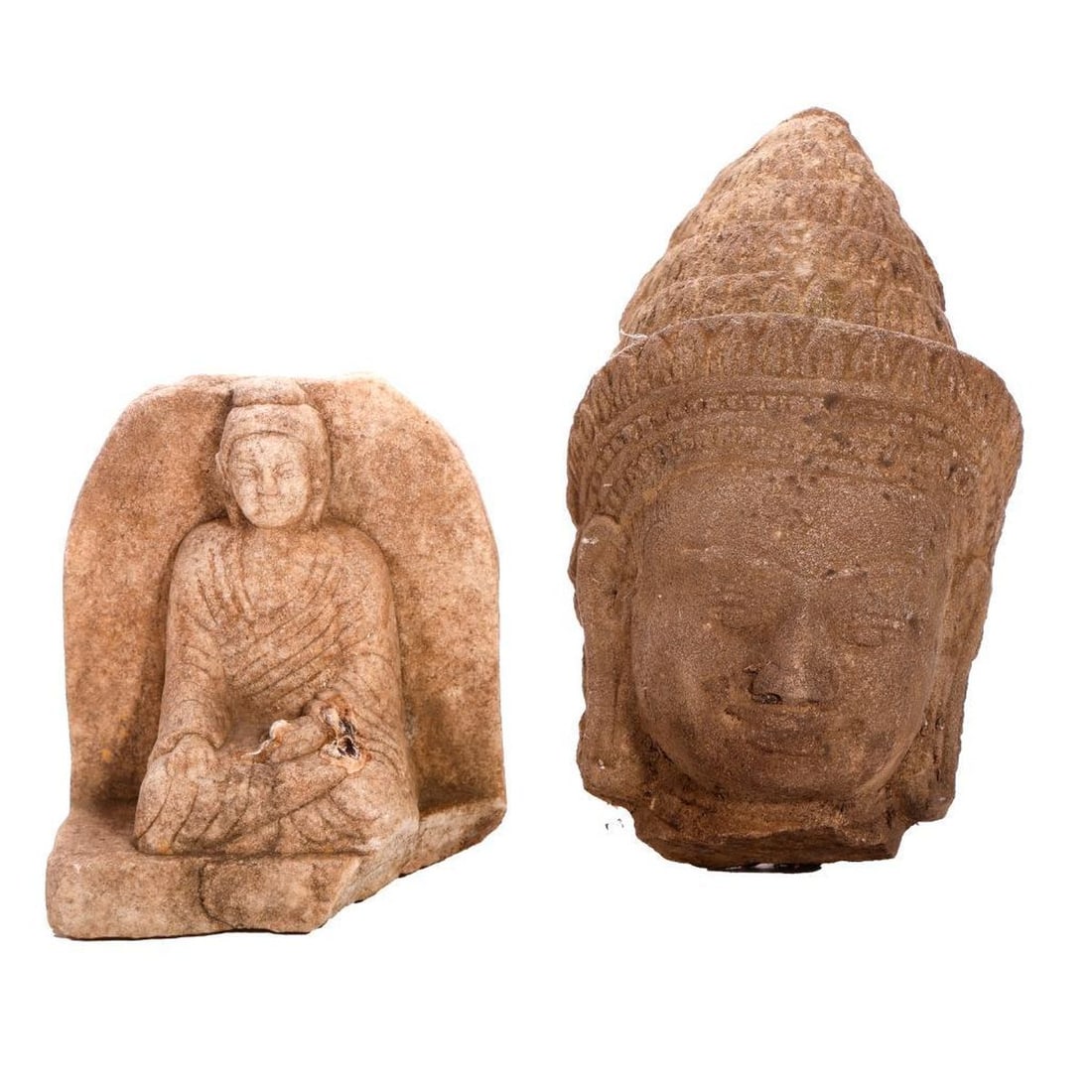 Two Asian Stone Carvings: The first, an Indian grey stone figure of a Buddha wearing a stylized robe, seated on a stone bracket base with a plain arch back 6"h x 5"w x 3"d (loss of big piece of base approximately 2"w x 3"d in