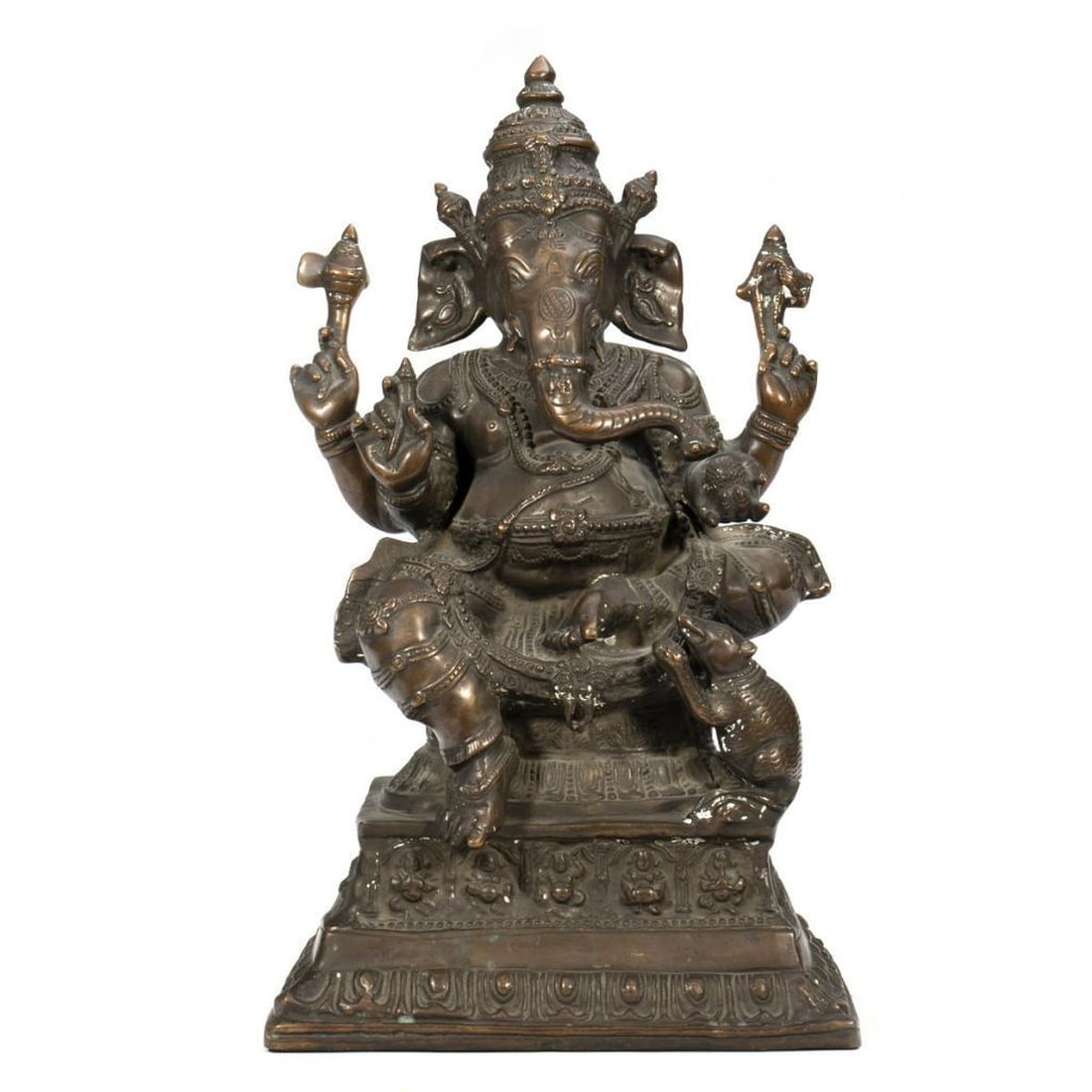 Large Bronze Ganesh with Rat.: The hollow form Ganesh is elaborately adorned and sits on an architecturally molded three-level plinth, on which stands a rat offering a piece of fruit. 21 1/2" H x 12 1/2" W x 9 1/2" W.