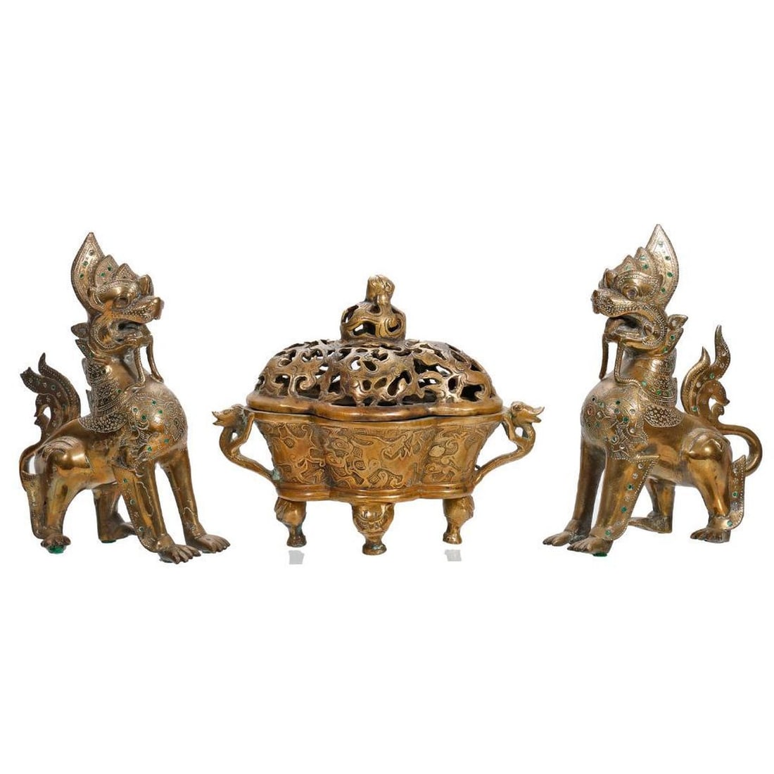 Asian Metalwork Lot: Comprising a footed reticulated censer 7"h x 9"w; and a pair of inlaid fu lions 8"h [3 total]