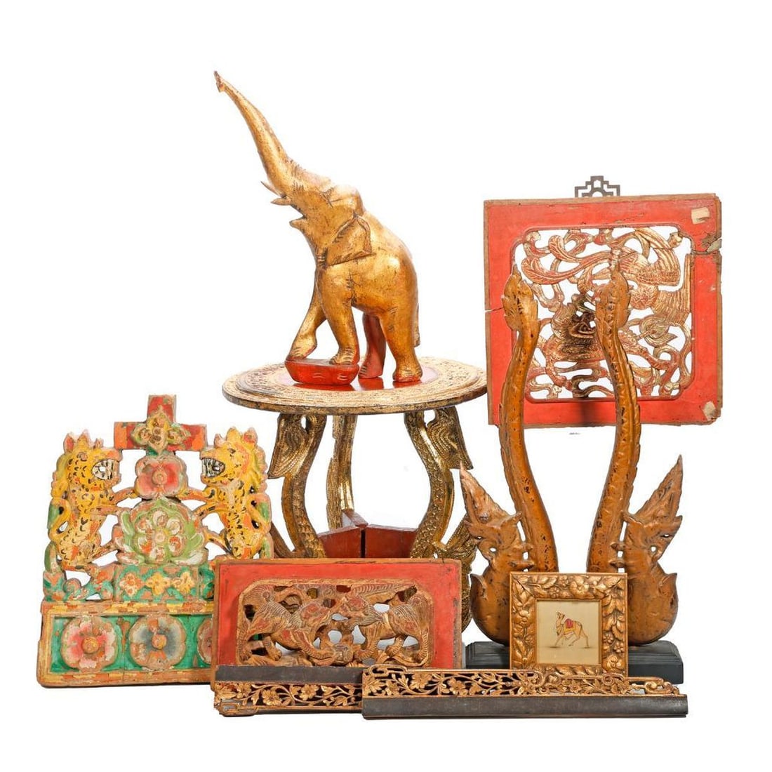 Six Asian Zoomorphic Wood Carved Items: Comprising a pair Thai Naga gilt wood dragon form architectural finials mounted on a single ebonized wood base, overall 14.75"h x 9"w x 2.5"d; a Thai tripod stand rising on Naga dragon