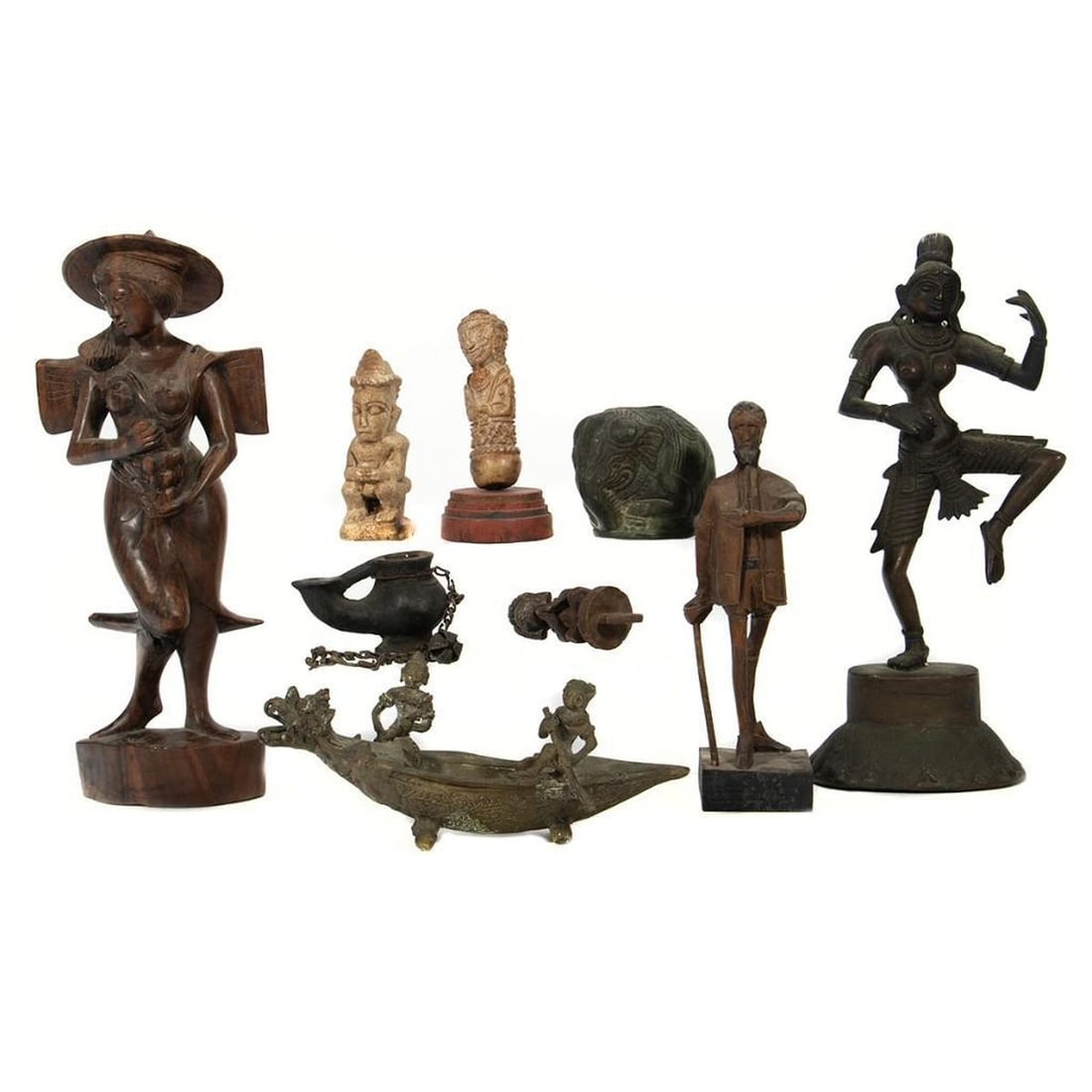 Southeast Asian Figures: Nine figures, Including a Thai Bronze, and elephant form vase, a Philippine carved figure and a Spanish carved figure. Greatest height: 12in. (30cm) Condition: Minor abrasions.
