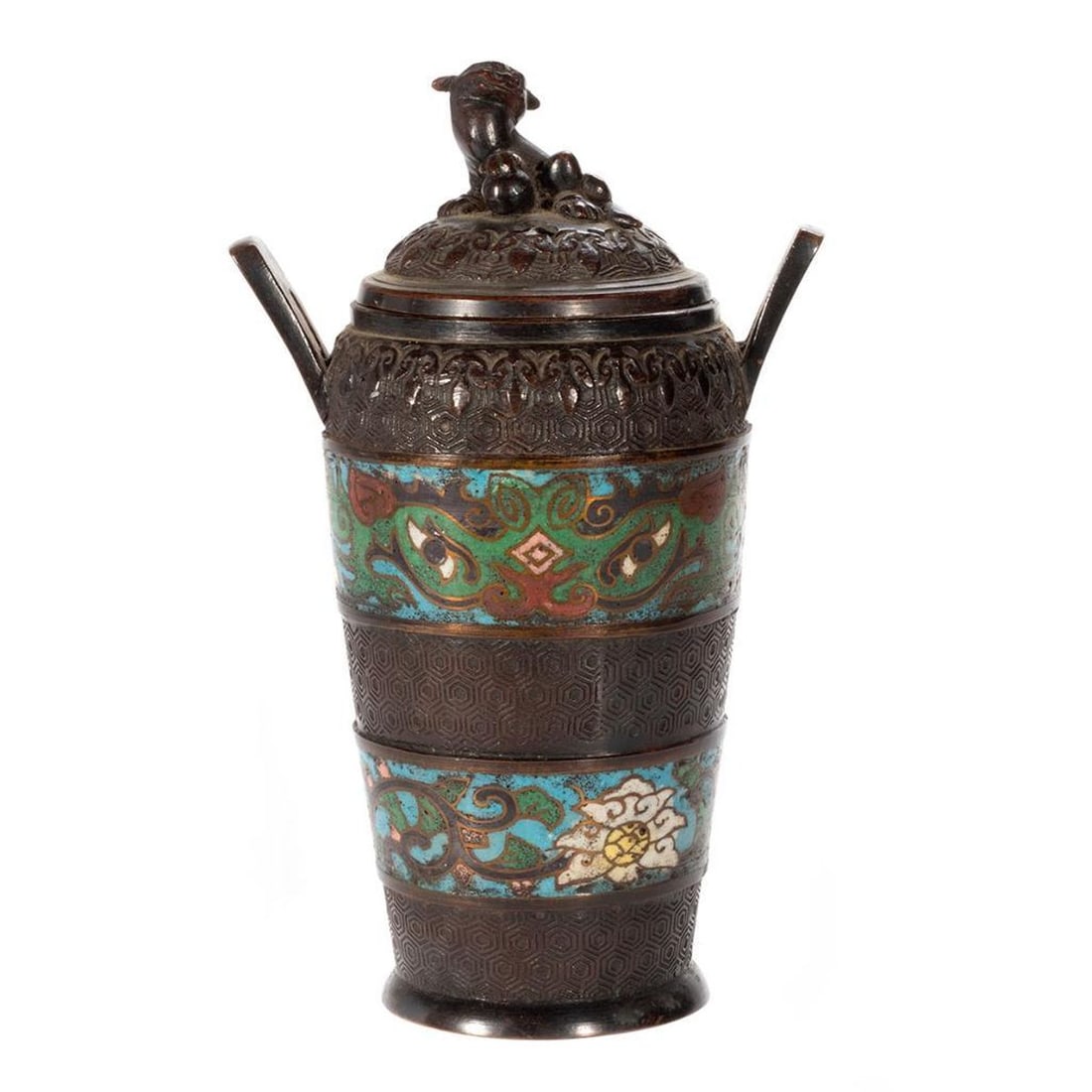 Chinese Champleve Enamel Urn: The cylindrical form having twin flaring outset handles, floral cloisonne inlaid bands and a dome shaped lid with Fu dog finial 8"h. Condition: Very good, minor pitting to cloisonne