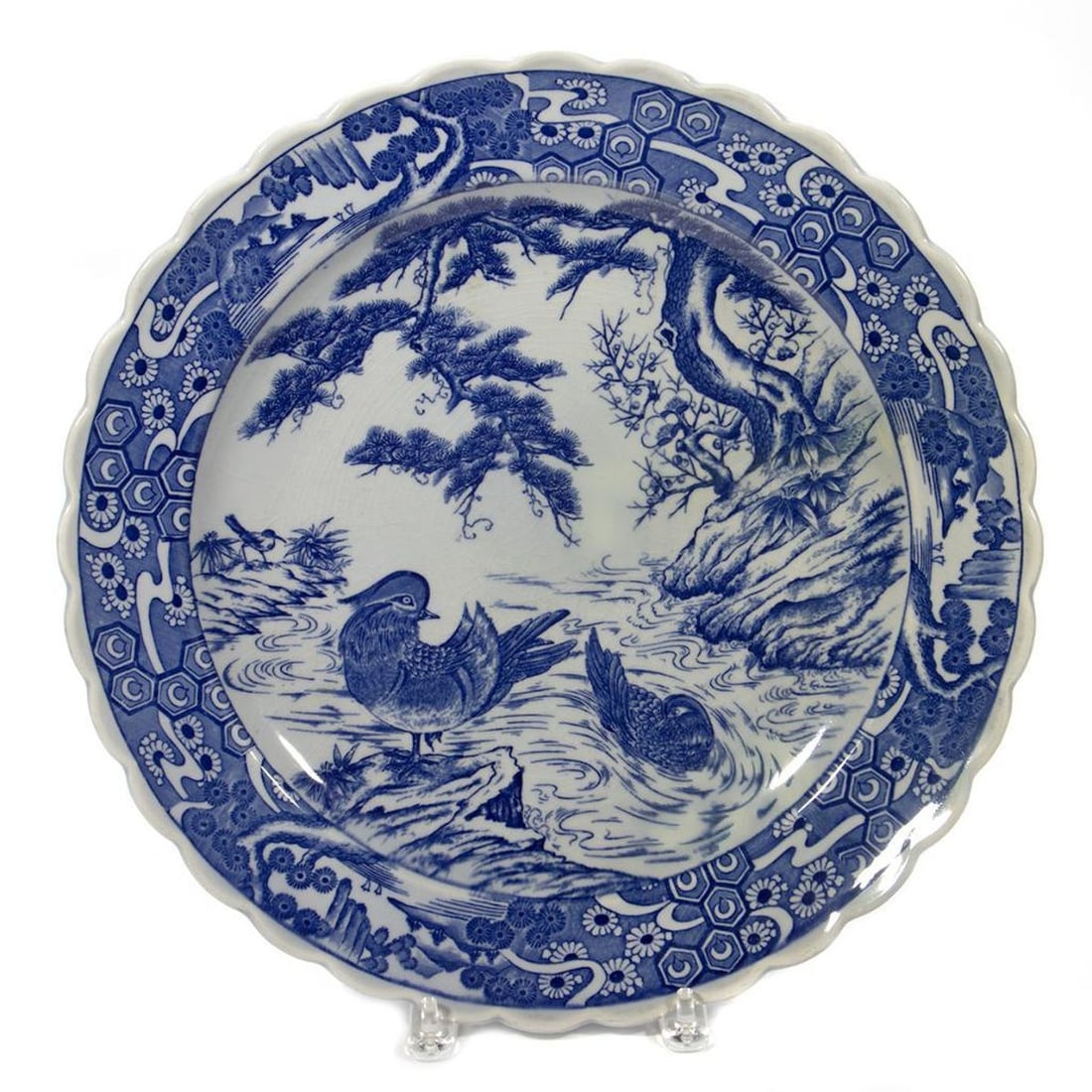 Imari Porcelain Charger: Blue and white woodland decorated. 16in. (41cm) d.