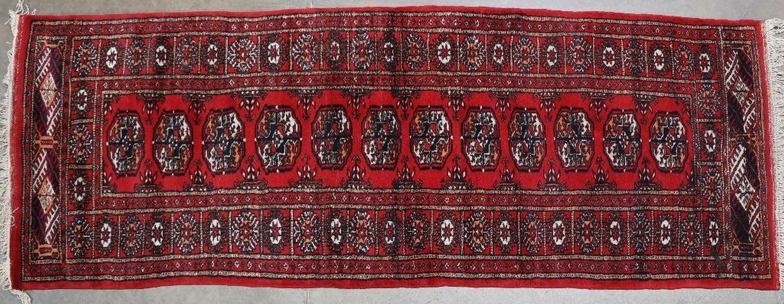 Bokhara Runner: Size approximately 8 feet 9 inches x 2 feet 7 inches.