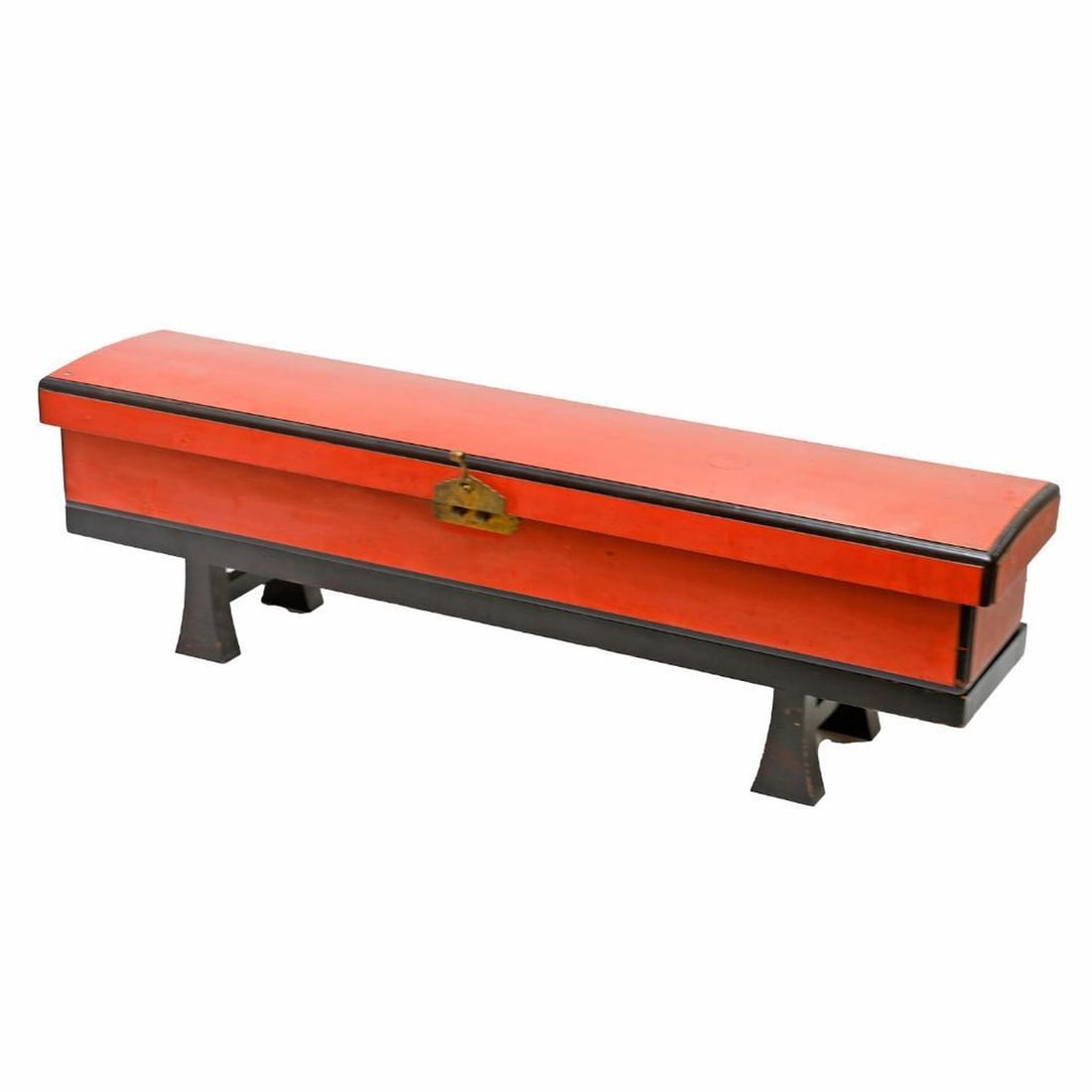 A Japanese Negoro Lacquer Case for Bow and Arrows: Late Meiji Period. The large rectangular chest lacquered in red with edges lacquered glossy black, applied brass hinges and lock plate, the underside black lacquer, 8"h x 54"l x 10.5"d; overall with