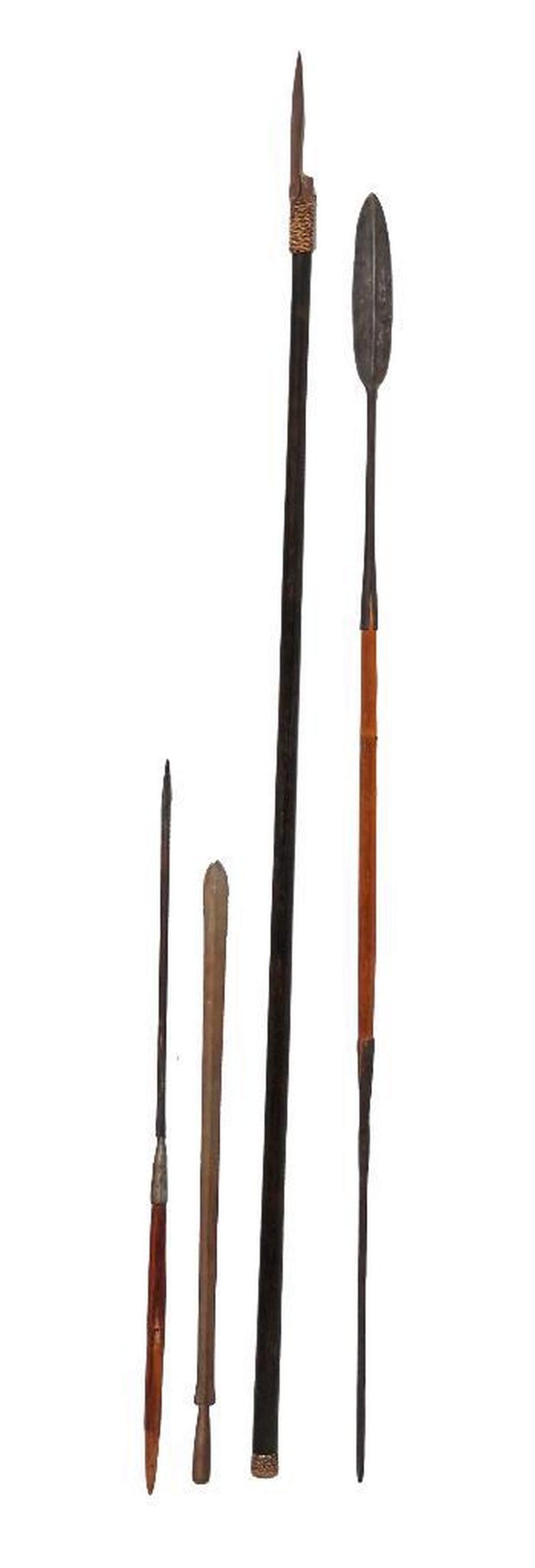 Two African Maasai Spears and A Borneo Sumpit: Comprising two Maasai wood spears, the one with a leaf-shaped forged iron blade at one end; the other, a hunting spear with a long slender blade, both having a shorter iron forged butt spike or ferrul