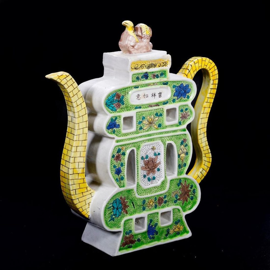 Chinese Kangxi Style Famille Verte Puzzle Teapot: Republic Period, the body molded in form of the longevity character "shou", inset panel reading "ji xiang ruyi" (good fortune), flanked between the handle and the spout faux painted to imitate