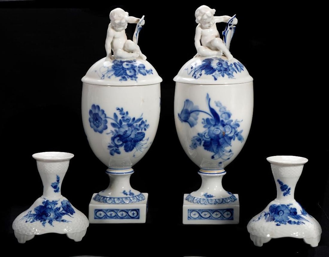 Pair Royal Copenhagen Blue Flower Covered Urns: The pair of urns with figural covers; en suite with a pair Blue Flower Curved candle stands [4 Total]