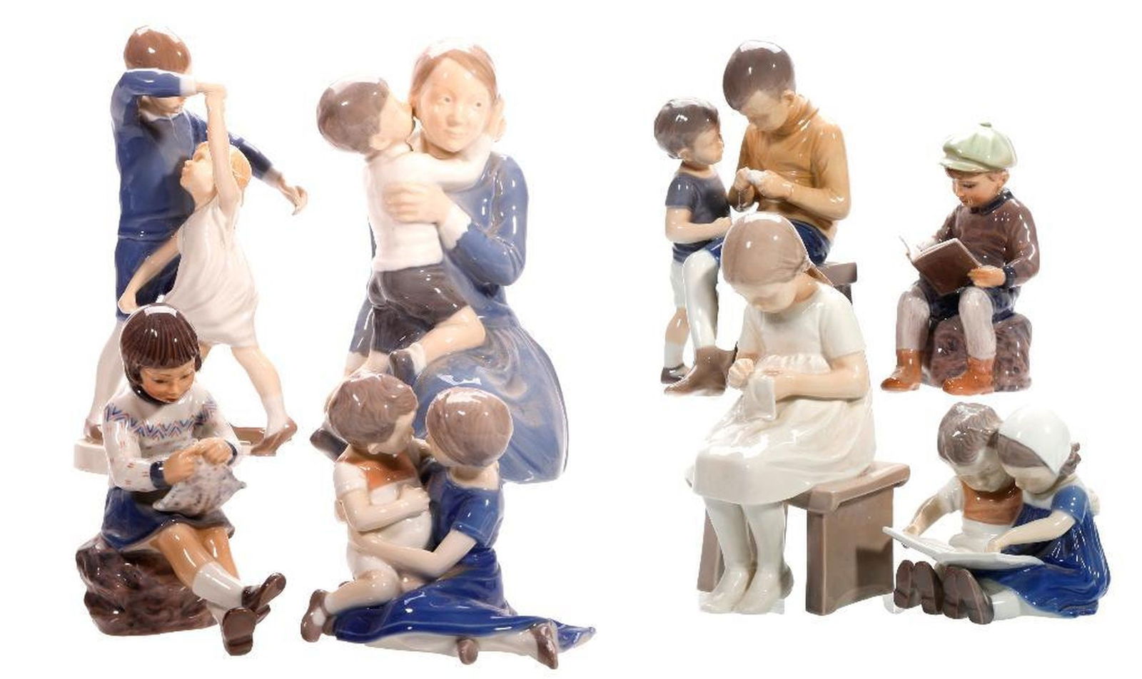 Seven Danish Porcelain Figural Groups: Comprising (5) Bing & Grondahl designed by Ingebord Plockross Irminger including an "Embracing Children" #1568; a girl sewing #1879 7.5"h; a "Laesende born" (Children Reading) #1537; "Dancing School"