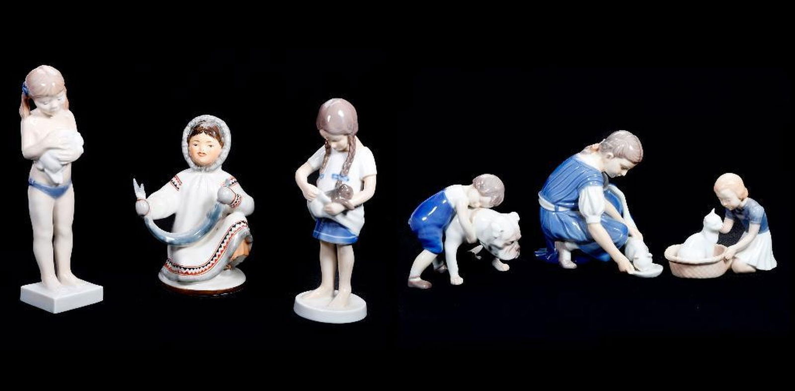 Six European Porcelain Figural Groups of Child with an Animal (1 of 5)