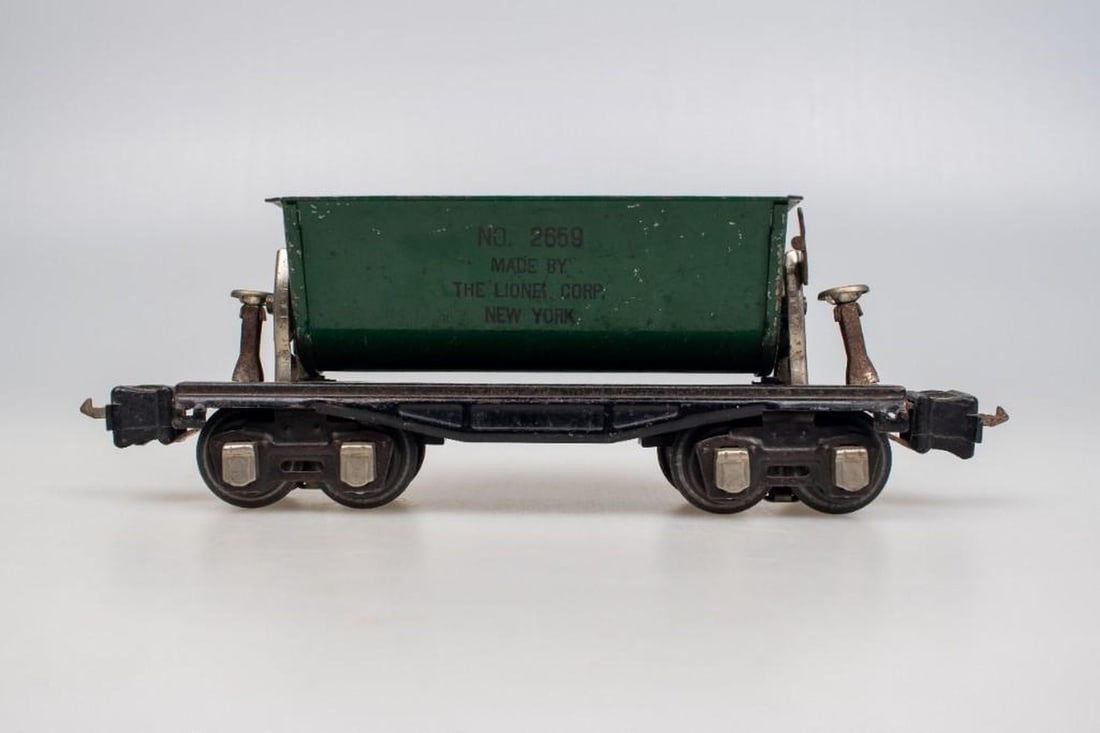 Lionel O Gauge Pre War box coupler freight cars: Lionel O Gauge Pre War Box Coupler Freight Cars 2652 Yellow Gondola black journal covers 2654 Orange Shell Tank Car black journal covers 2659 Green Dump Car black journal covers 2679 Baby Ruth Box Car