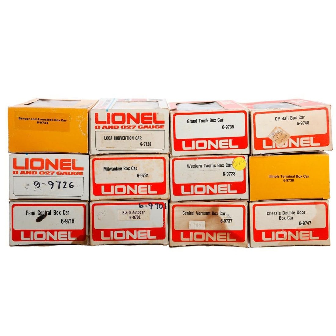 (12) Lionel O Gauge Modern Era Freight Cars: (12) Lionel O Gauge Modern Era Freight Cars - in original boxes. 6-9701 Baltimore & Ohio Autocar double door box car. Worn & stained box, 6-9716 Penn Central opening door box car. Worn box. 6-9723 Wes