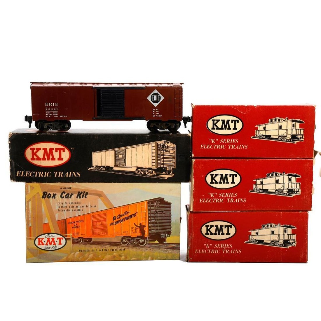 (6) KMT O Gauge Freight Cars: (6) KMT O Gauge Freight Cars C-528 New Haven Caboose in original box missing main flap one end 910 Missouri Pacific Caboose in original box 13518 CB&Q Caboose in original box 25439 Erie Box Car with o