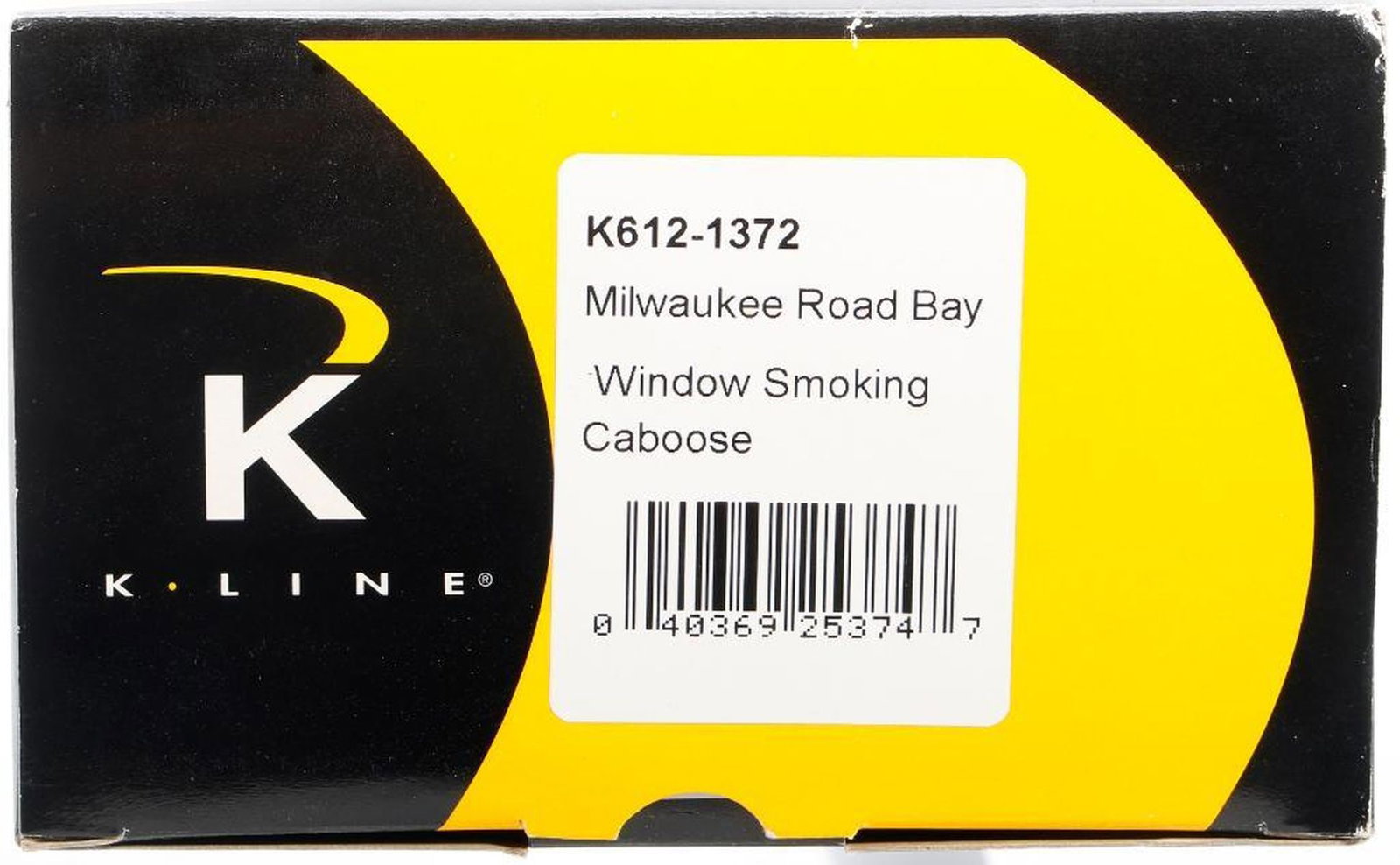 K-line O Ga Milw Road Bay Window Smoking Caboose: K-line O Gauge K612-1372 Milwaukee Road Bay Window Smoking Caboose in original shelf/storage worn packaging.