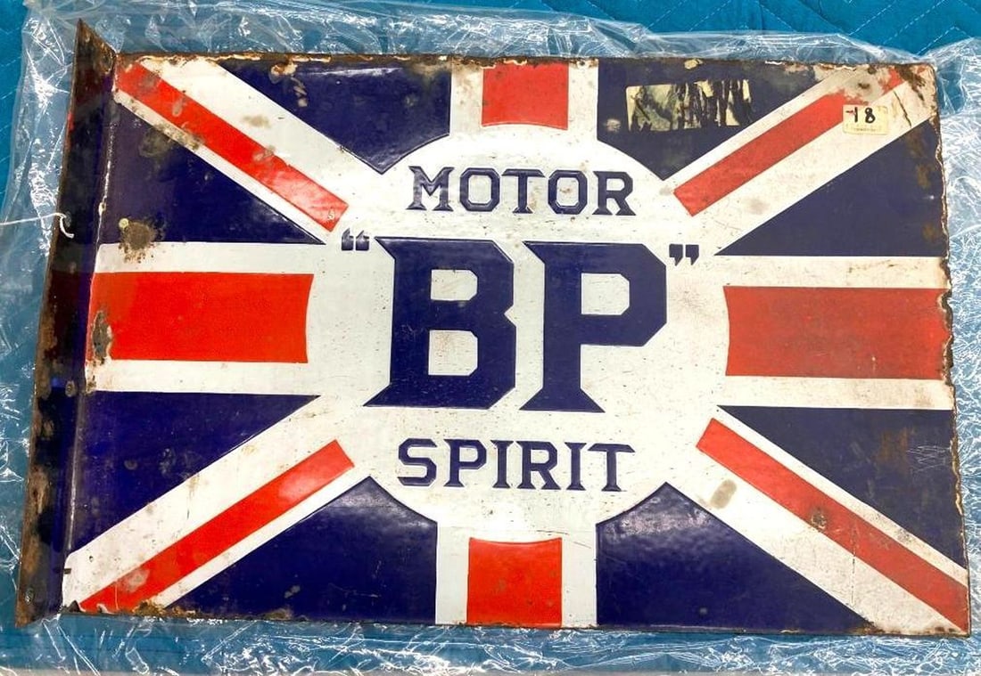 Motor BP Spirit Enameled Advertising Sign: Circa 1930, the rectangular enameled metal sign featuring the Union Jack red white and blue flag as background centering in white medallion "MOTOR/BP(larger size)/SPIRIT" in cobalt blue letters. Dimen